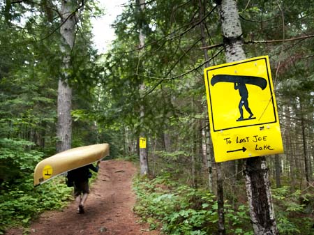 Algonquin-Park-Portager-With-Portage-Signs